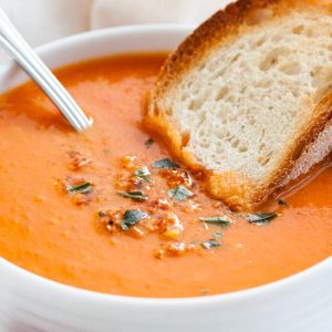 Tomatoes Soup Served with Bread Roll