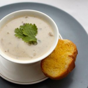 Cream of Mushroom Soup Served with Bread Roll