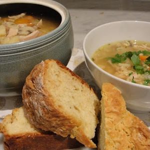 Cream of Chicken Soup Served with Bread Roll
