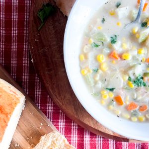 Sweet corn Soup Served with Bread Roll