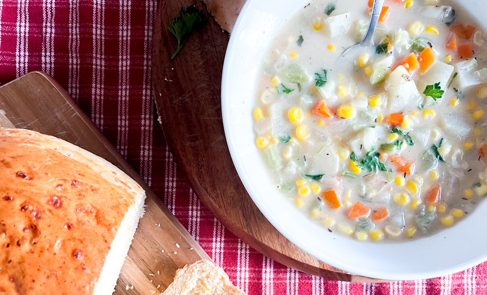 Sweet corn Soup Served with Bread Roll